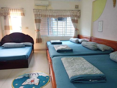 Postel nebo postele na pokoji v ubytování Motel Thanh Huyền - Bãi sau