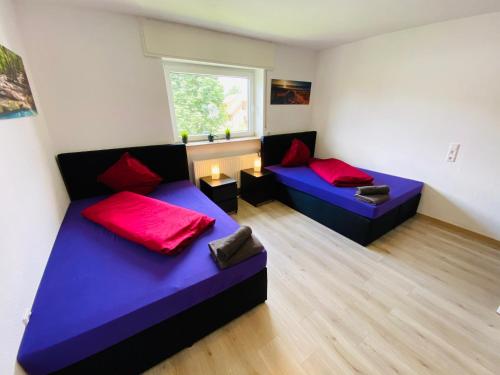 Ένα ή περισσότερα κρεβάτια σε δωμάτιο στο Big Apartment I 4 Rooms I 6 Beds I 120 sqm I Fast Internet