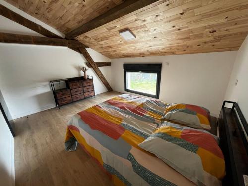 En eller flere senge i et værelse på Villa en campagne