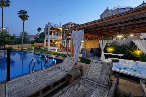 Πισίνα στο ή κοντά στο Oasis Palace