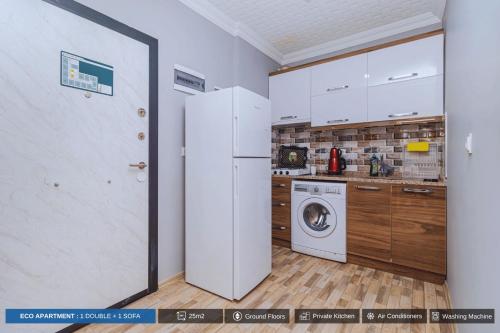 Η κουζίνα ή μικρή κουζίνα στο Antalya Residence