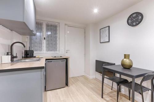 Photo de la galerie de l'établissement Appartement de charme au coeur du Sentier, à Paris