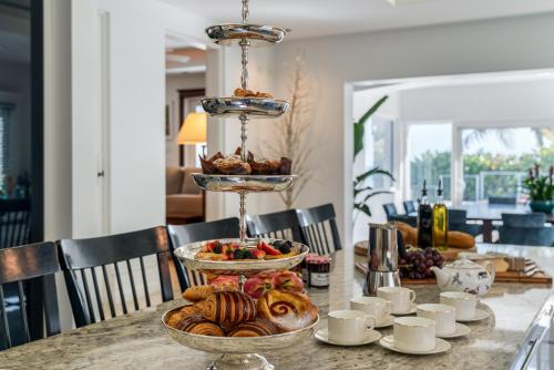 a table with three plates of food on it at Pease Bay House in Breakers