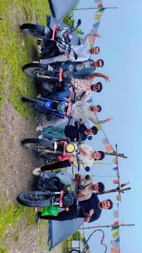 a group of people on bikes in a row at TEC Resort and bar in Dharān Bāzār