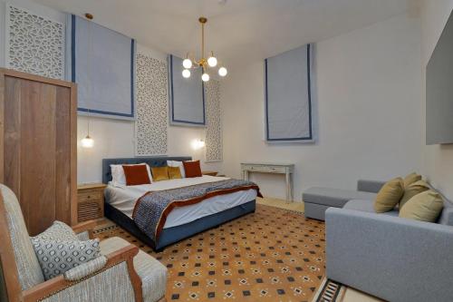 Ένα ή περισσότερα κρεβάτια σε δωμάτιο στο Oasis Palace