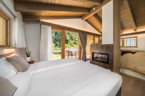 A bed or beds in a room at VILLAGGIO VAL MOLINI
