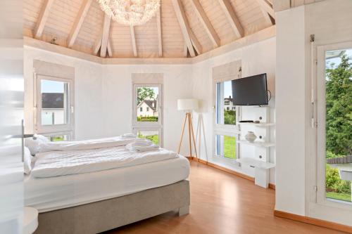 Voodi või voodid majutusasutuse Villa architecte lumineuse avec jardin privé toas