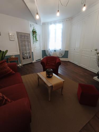 Posezení v ubytování Le Liberté appartement privatif