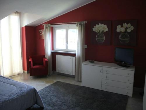 Postel nebo postele na pokoji v ubytování Rosta Residence Ranverso