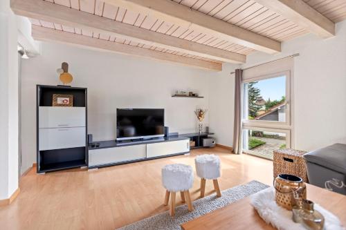 Posezení v ubytování Villa architecte lumineuse avec jardin privé