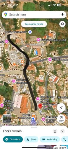 a screenshot of a map of a city at Fori's rooms in Himare