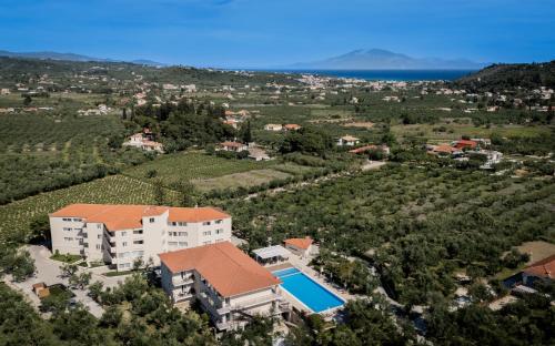 an aerial view of a house with a swimming pool at Hotel Varres in Zakynthos Town