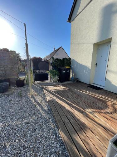 a wooden deck in front of a building at Belle Nuit in Bout dʼAmont