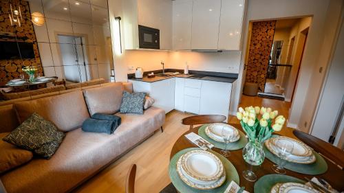 Kuchyňa alebo kuchynka v ubytovaní Apartamenty Sun & Snow Krynica Zdrój Pułaskiego