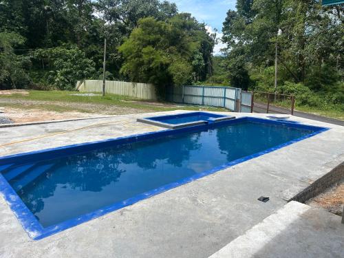 Bazén v ubytování MyDusun Chalet, Taiping, Perak, Malaysia nebo v jeho okolí