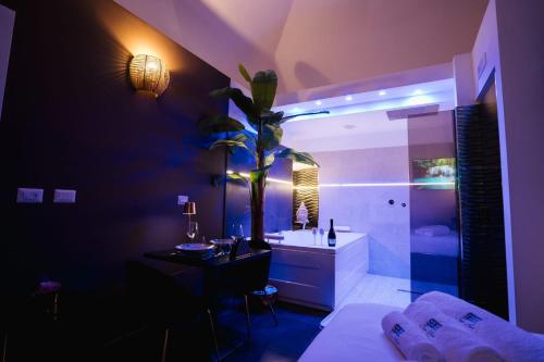 a large bathroom with a sink and a shower at Tesse Suite in Canosa di Puglia