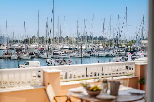a view of a marina with boats in the water at Christina's apartment in Kontokali
