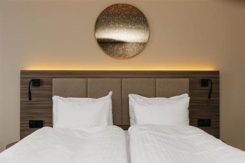 Postel nebo postele na pokoji v ubytování Best Western Plus Kalmarsund Hotell