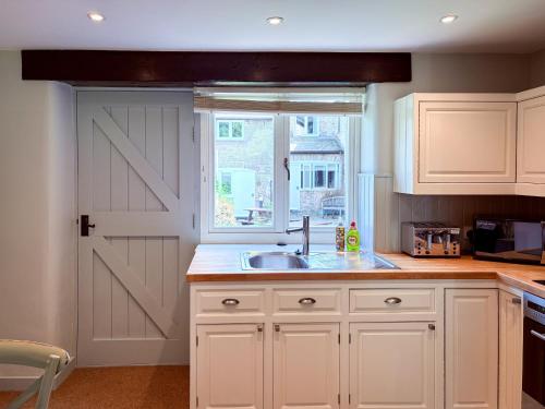 Η κουζίνα ή μικρή κουζίνα στο Greenwood Grange