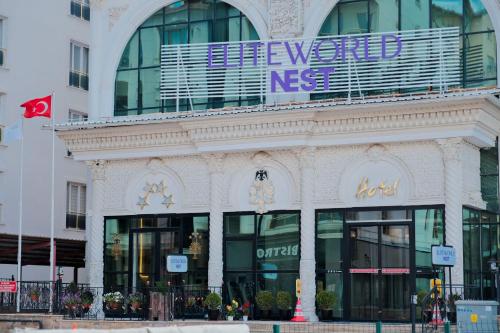 a building with a sign on the side of it at Elite World Nest Sivas in Sivas