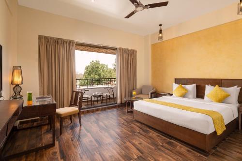Ein Bett oder Betten in einem Zimmer der Unterkunft The Summer House, Pachmarhi - AM Hotel Kollection
