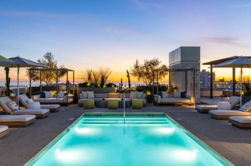 a pool on the roof of a hotel at The Diamond Dune Three floors Two Balconies BBQ in Los Angeles