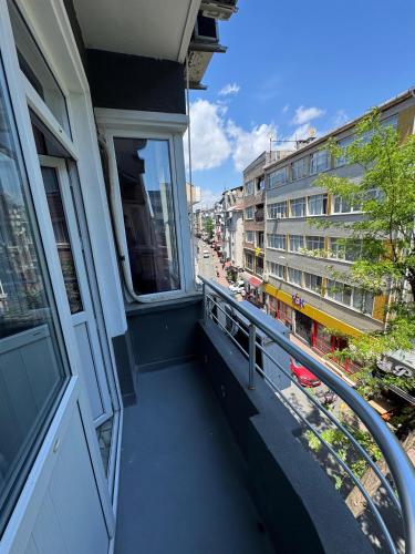 a balcony of a building with a view of a street at beyzade apart hotel in Istanbul