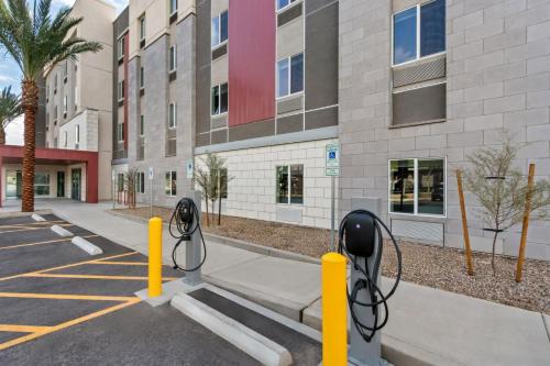 a parking lot in front of a building at Everhome Suites Ocala I-75 North in Ocala