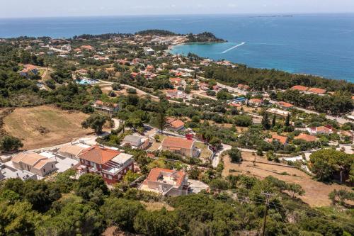an aerial view of a house with the ocean at Sunset Elysian in Argostoli
