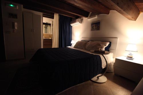 Centro storico apartment & Loft - Amnesia Holiday Homeにあるベッド