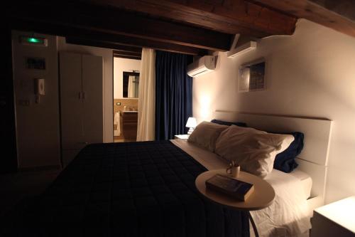 Centro storico apartment & Loft - Amnesia Holiday Homeにあるベッド