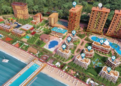 een kaart van een stad met gebouwen en een strand bij Dreamland oasis in Chakvi