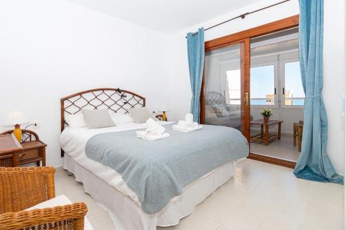Ένα ή περισσότερα κρεβάτια σε δωμάτιο στο Casa Playa Seaside Duplex