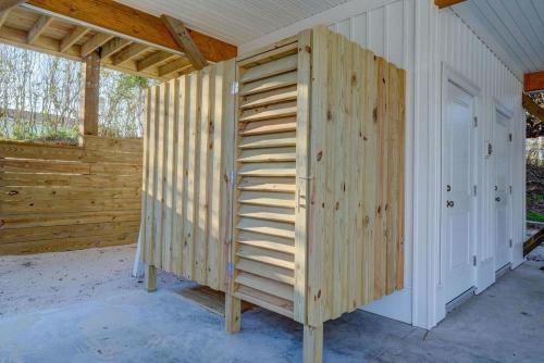 a wooden wall on the side of a house at 2701- A S Shore Drive - Threefoot in Surf City