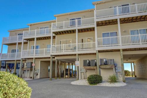 a large apartment building with balconies at Sea Star Village 320 in West Onslow Beach