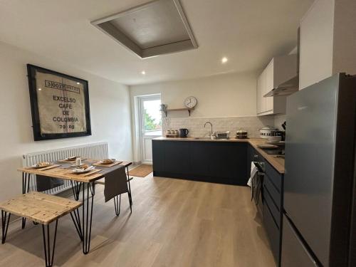Kuchyň nebo kuchyňský kout v ubytování Brewe's Loft
