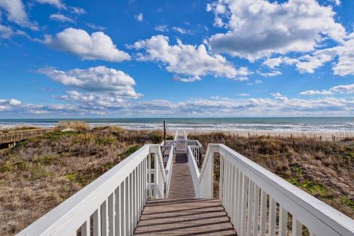 a boardwalk to the beach on a sunny day at 3530 Island Drive in North Topsail Beach