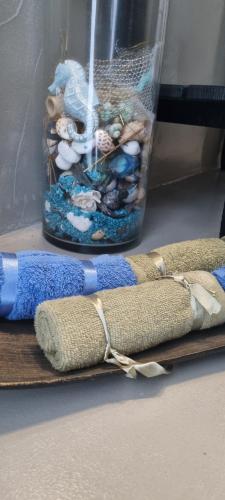 a wooden cutting board with three different types of yarn at The Cliff in Melínta