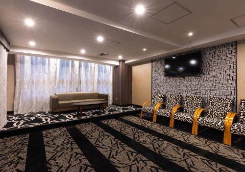 TV a/nebo společenská místnost v ubytování APA Hotel Niigata Higashinakadori