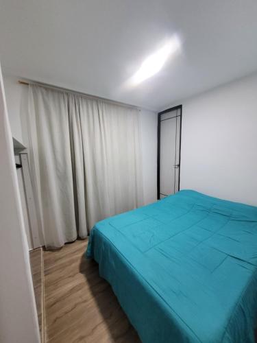 Un ou plusieurs lits dans un hébergement de l'établissement Apartamento en Pamplona, comodidad y ubicación ideal