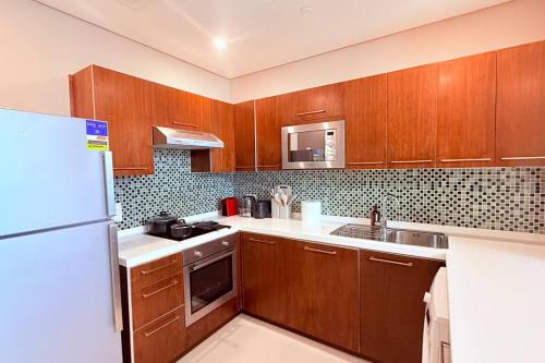 Fotografie z fotogalerie ubytování 75 inch TV Sea View Balcony 12th Flr v destinaci Manama