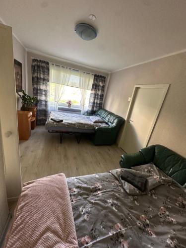 Una cama o camas en una habitación de Tallinn Randla 14