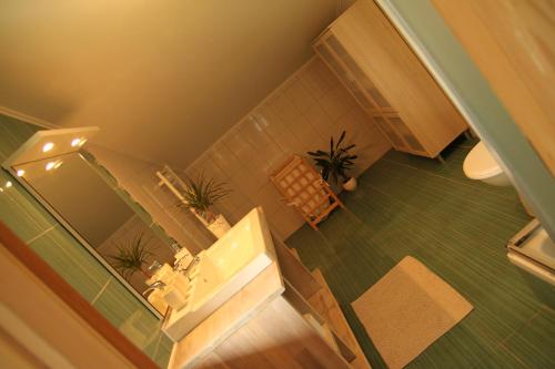 an overhead view of a bathroom with a sink at Apartments Strmac in Slunj