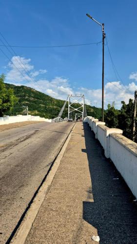 a bridge on the side of a road at Mirador del Río in Honda