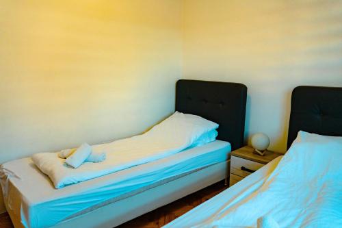 Katil atau katil-katil dalam bilik di Deluxe apartments