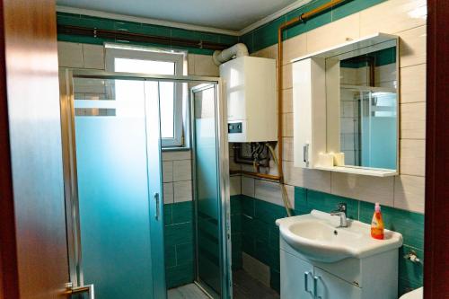 Bilik mandi di Deluxe apartments