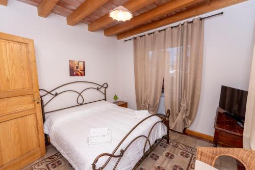 Posteľ alebo postele v izbe v ubytovaní Villa Tecla