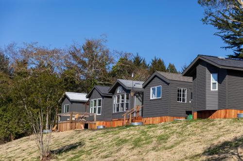 a row of houses on a hill at Camp Trinidad RV Resort in Trinidad