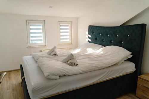 Katil atau katil-katil dalam bilik di Deluxe apartments