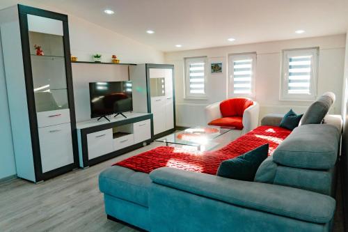 Televisyen dan/atau pusat hiburan di Deluxe apartments